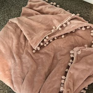 pink throw blanket